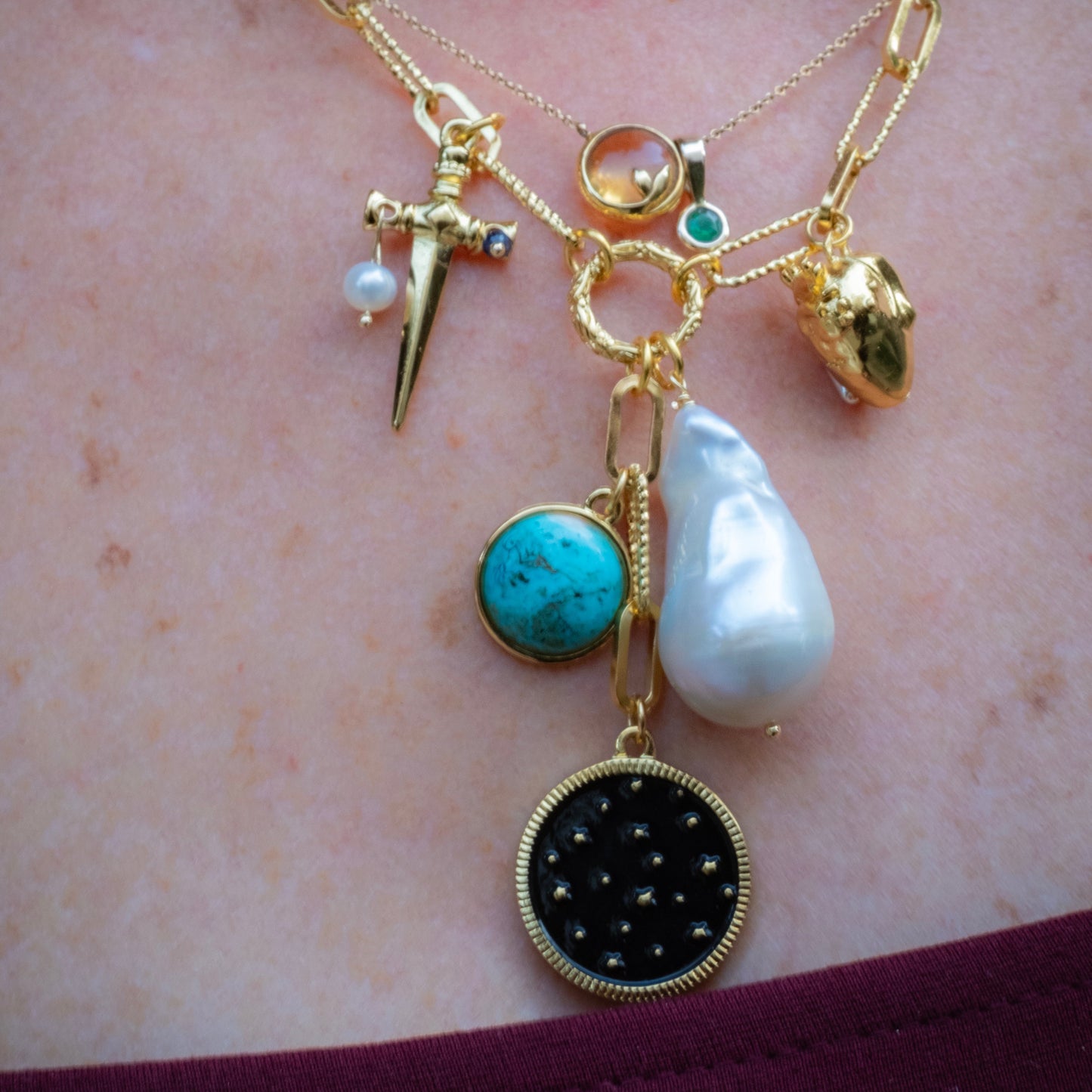 Dije arquetipos baño de oro